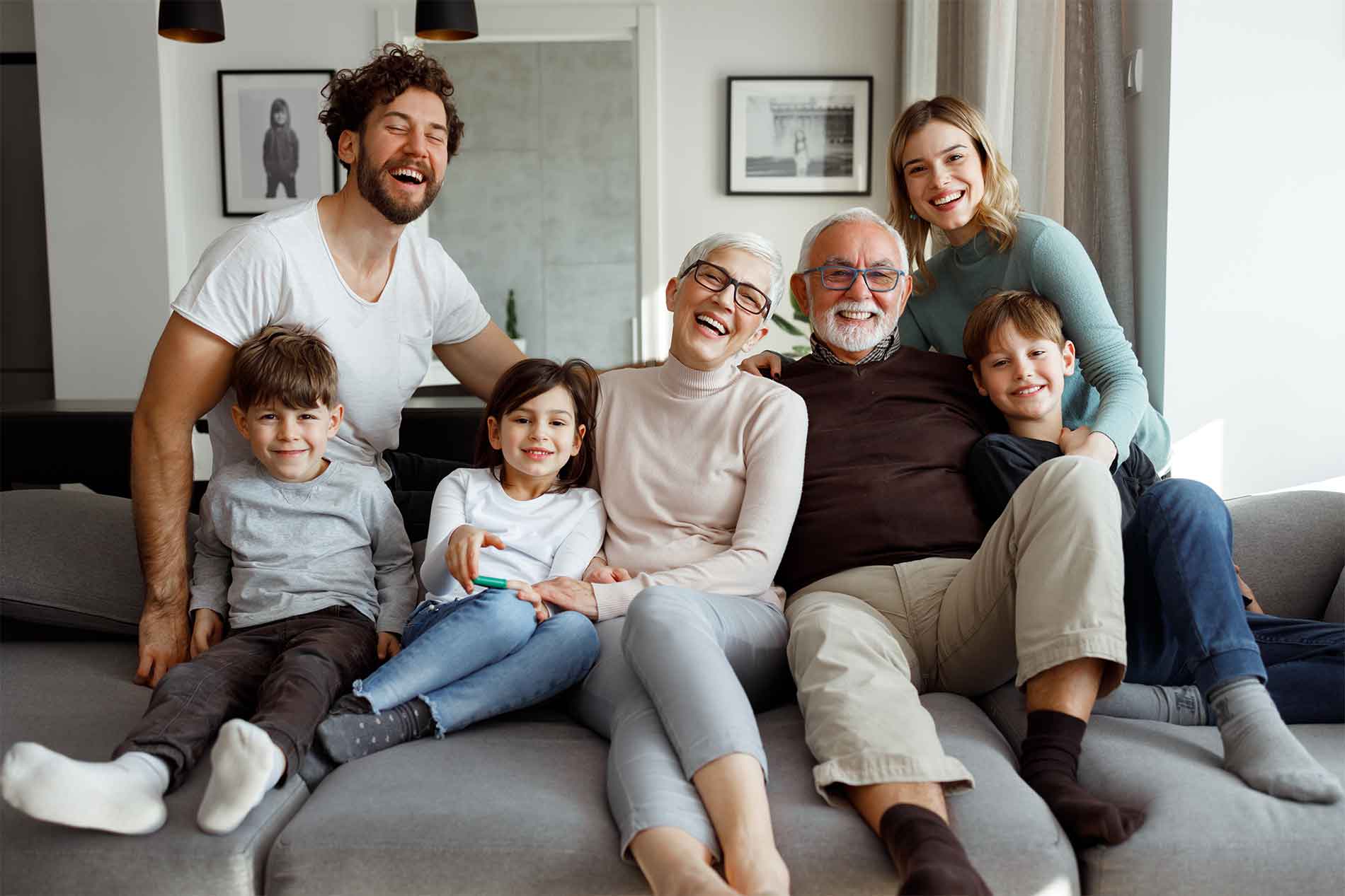 Family gathered together on a couch